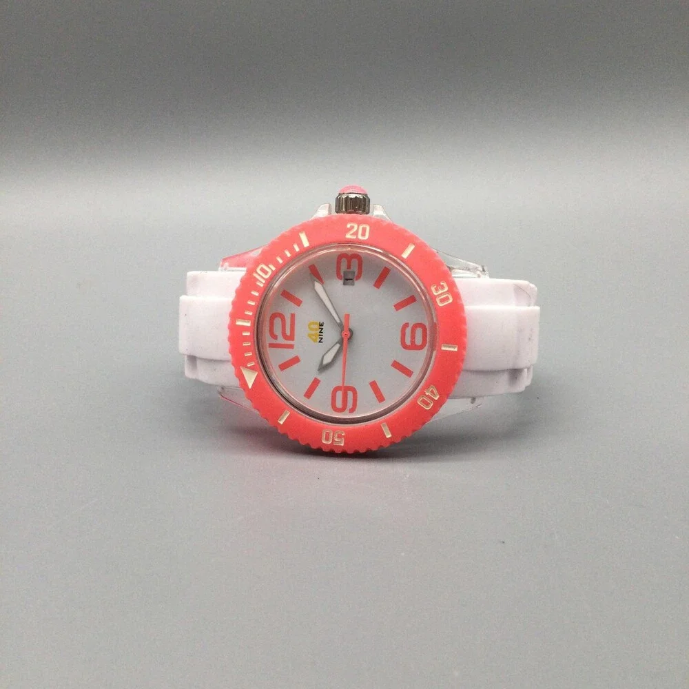 40nine Womens Watch 40mm Pink Case White Silicone Strap Date Quartz 50m
